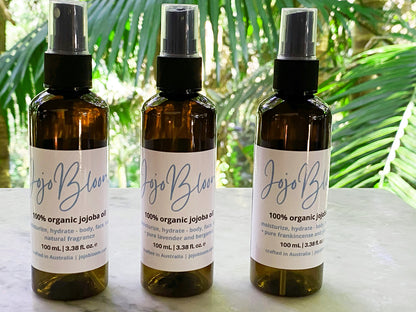 Jojo Bloom 100% organic jojoba oil 100mL. Choose from natural fragrance, or pure lavender & bergamot, or frankincense & ylang ylang essential oils